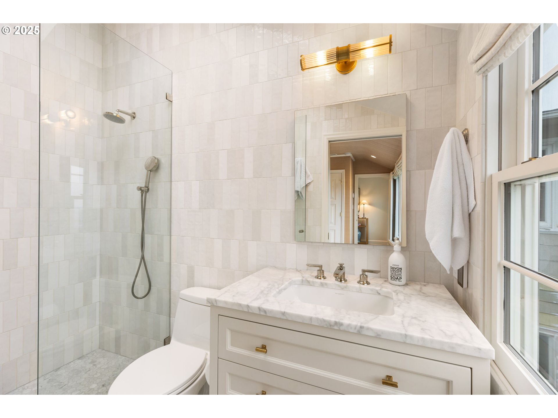 604 Northwest MacLeay Boulevard Portland, OR 97210 - Photo 38 of 46 a bathroom with a granite countertop sink a mirror and shower