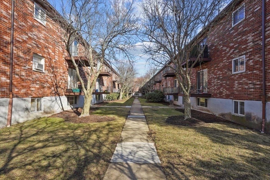22 Westgate Road, Unit 2 Boston, MA 02467 - Photo 17 of 19 a view of yard with wooden fence