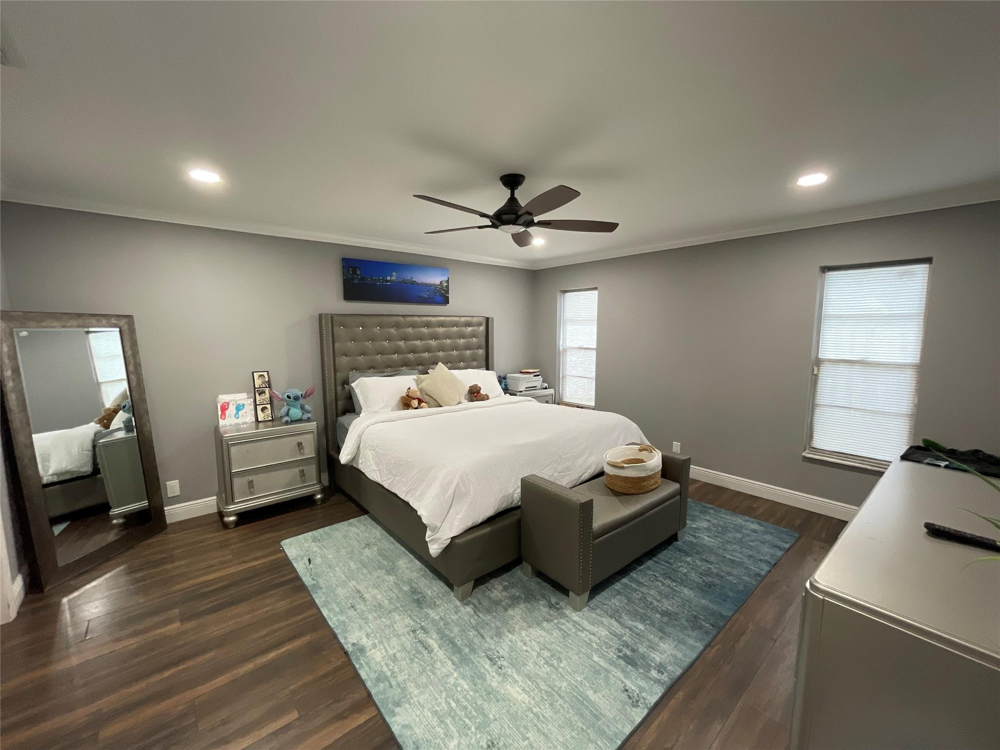 9020 Pine Springs Drive Boca Raton, FL 33428 - Photo 7 of 23 a bedroom with a bed window and a ceiling fan