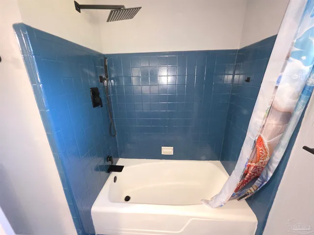 a bathroom with a bathtub