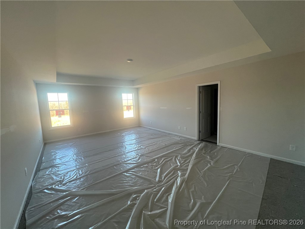 4075 Blue Springs Red Springs, NC 28377 - Photo 17 of 28 a view of an empty room and window and wooden floor