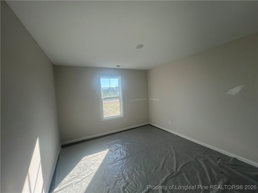 4075 Blue Springs Red Springs, NC 28377 - Photo 19 of 28 a view of an empty room and window