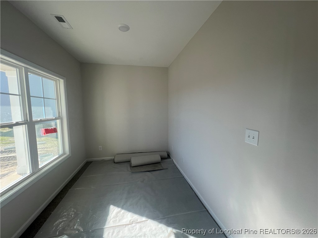 4075 Blue Springs Red Springs, NC 28377 - Photo 2 of 28 an empty room with windows