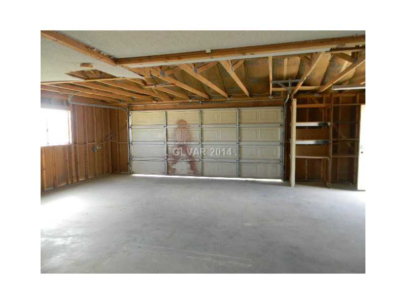 2570 West Simkins Road Pahrump, NV 89060 - Photo 7 of 20 Parking Lot. Interior garage