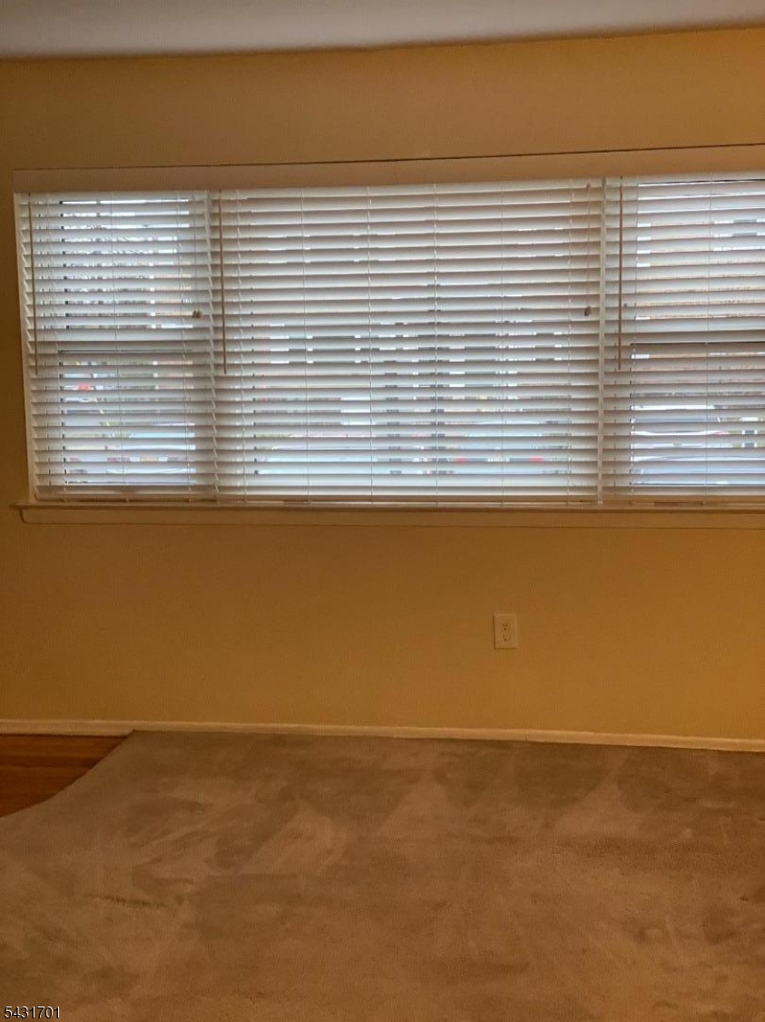 161 Evergreen Road, Unit 13A Edison, NJ 08837 - Photo 2 of 12 a view of a room that has a window