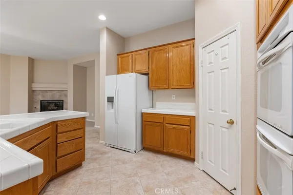 a view of a kitchen with a sink and a window