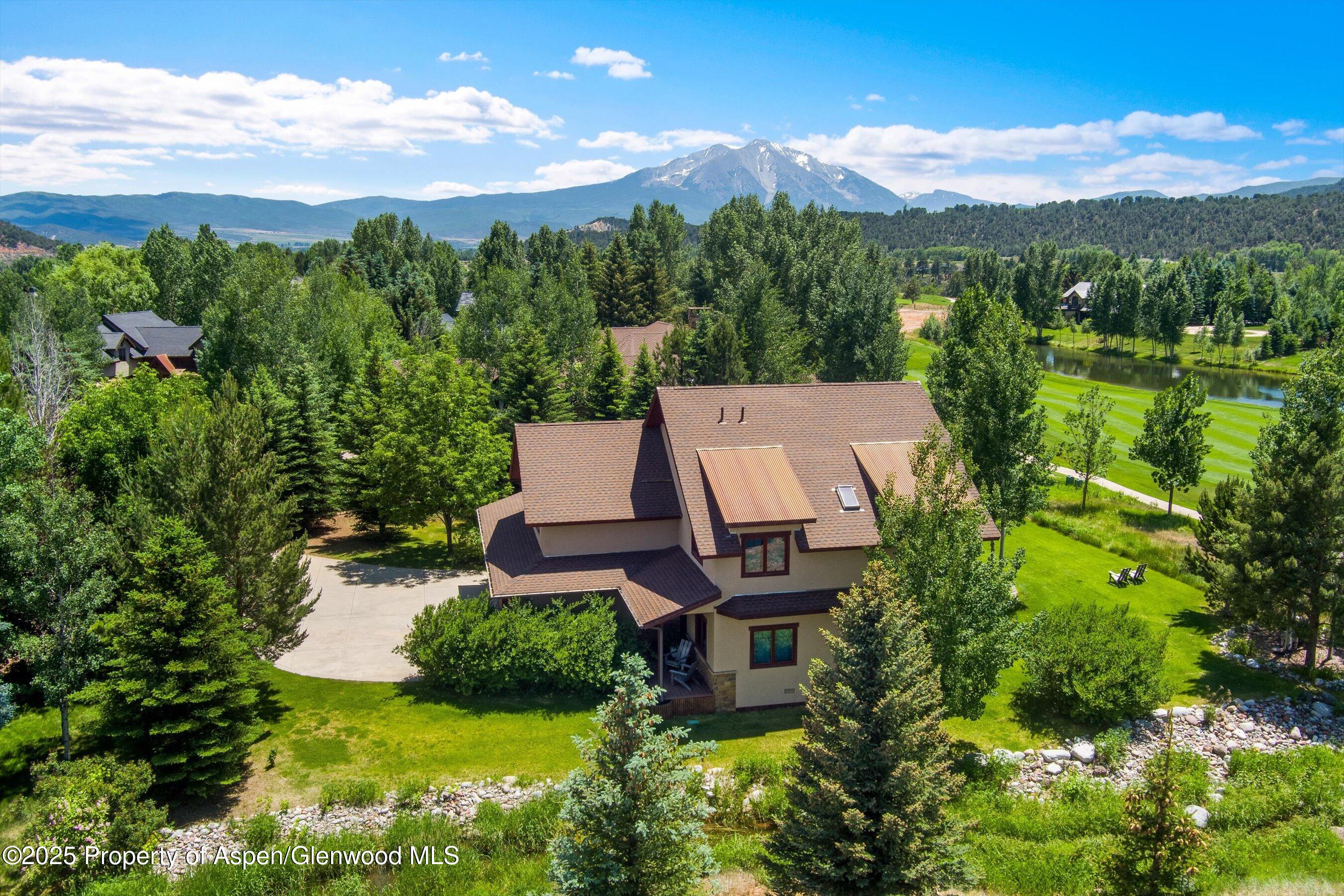 75 Buffalo Lane Carbondale, CO 81623 - Photo 1 of 49 a view of a patio with table and chairs and potted plants