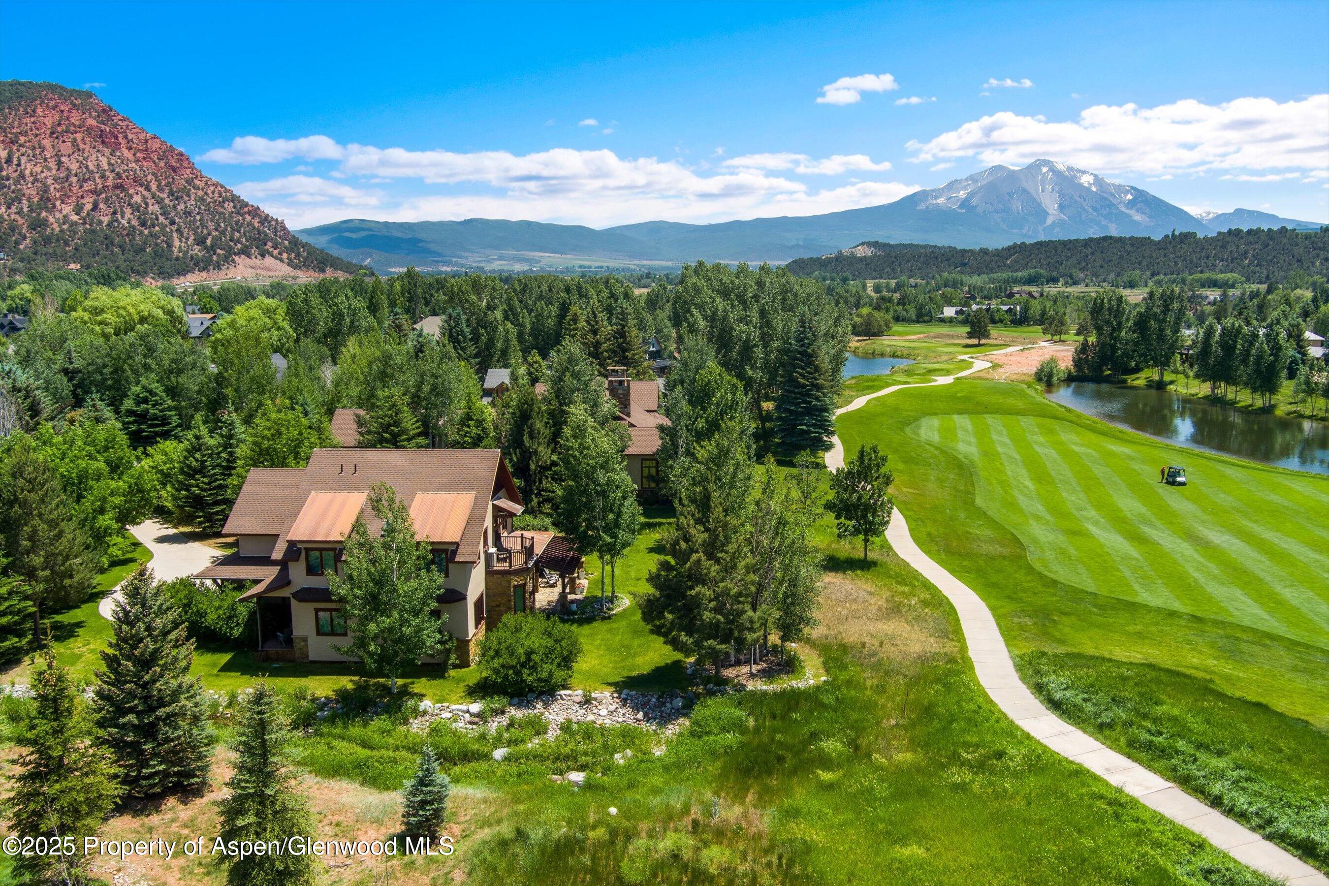 75 Buffalo Lane Carbondale, CO 81623 - Photo 17 of 49 an aerial view of a house with a garden and lake view