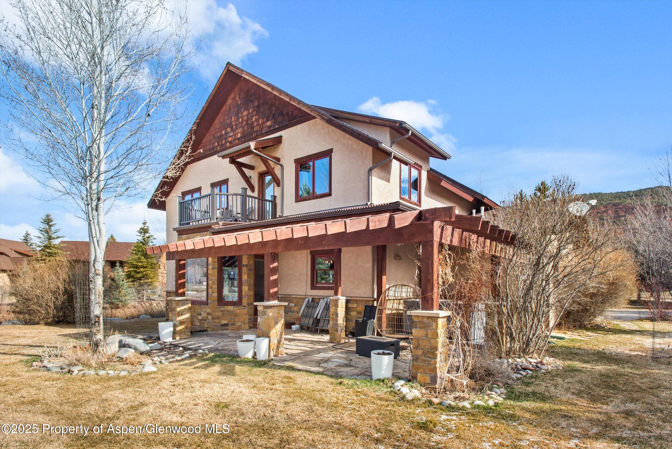 75 Buffalo Lane Carbondale, CO 81623 - Photo 22 of 49 a view of a house with a yard and sitting area