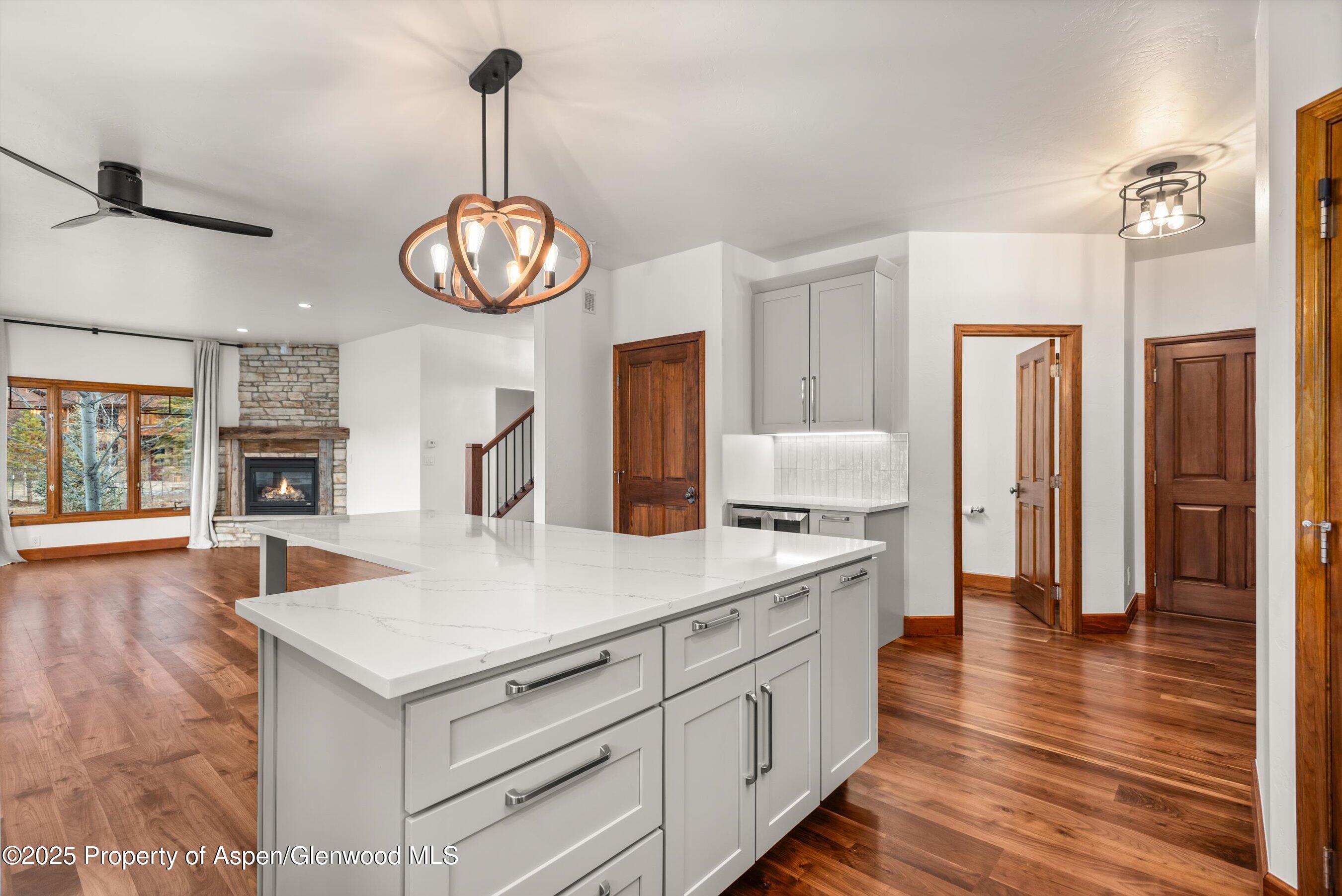 75 Buffalo Lane Carbondale, CO 81623 - Photo 26 of 49 a view of living room with kitchen island furniture and wooden floor