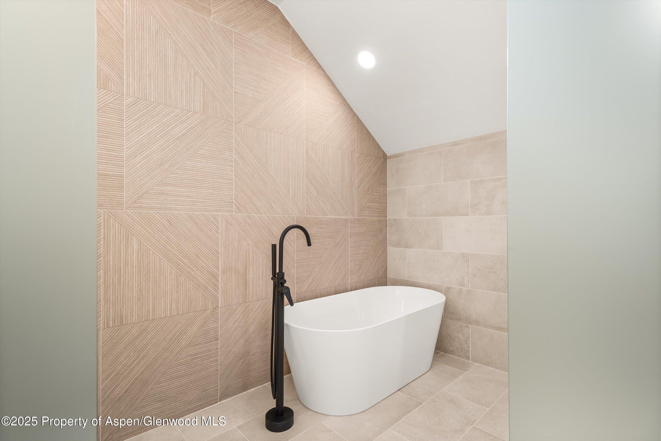 75 Buffalo Lane Carbondale, CO 81623 - Photo 32 of 49 a white tub sitting in a bathroom