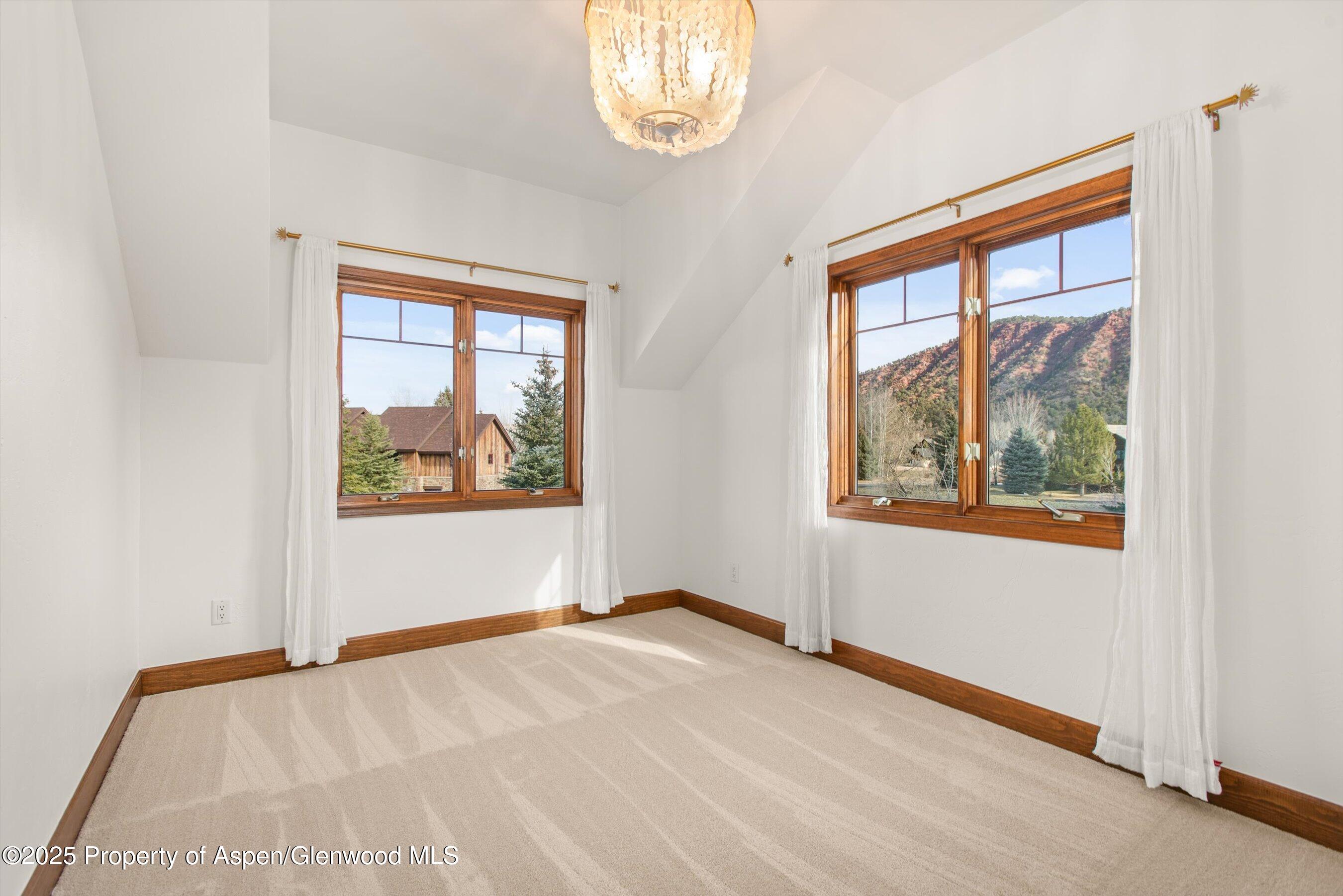 75 Buffalo Lane Carbondale, CO 81623 - Photo 37 of 49 an empty room with window and mirror