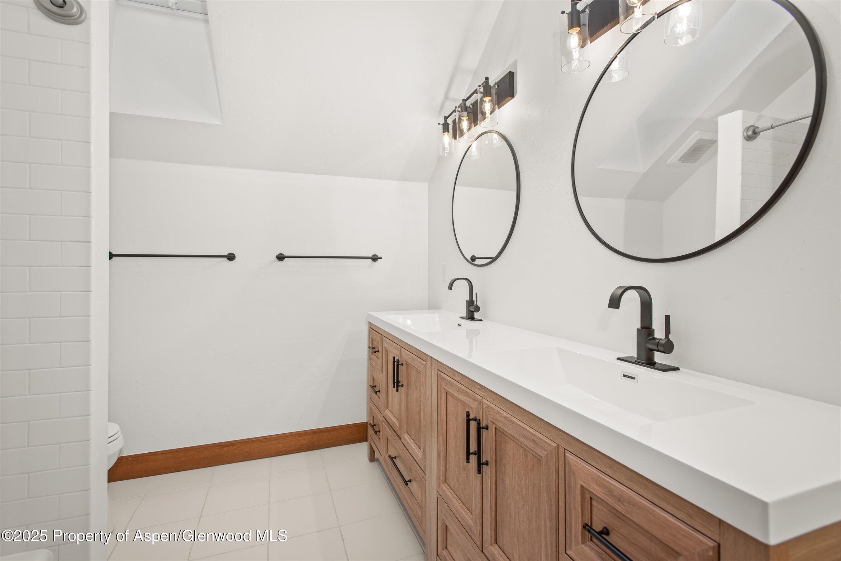 75 Buffalo Lane Carbondale, CO 81623 - Photo 38 of 49 a bathroom with a sink and a mirror