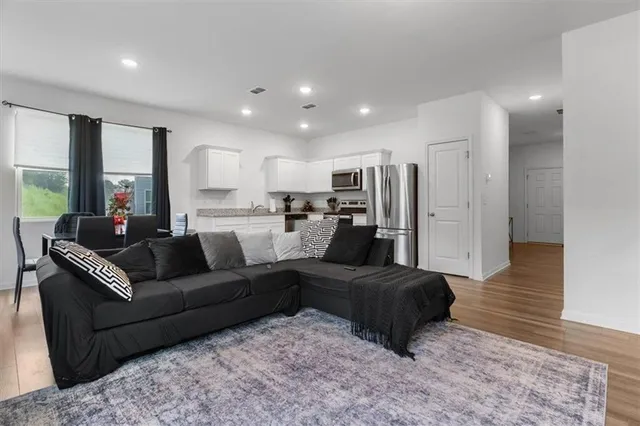 a living room with furniture and a couch