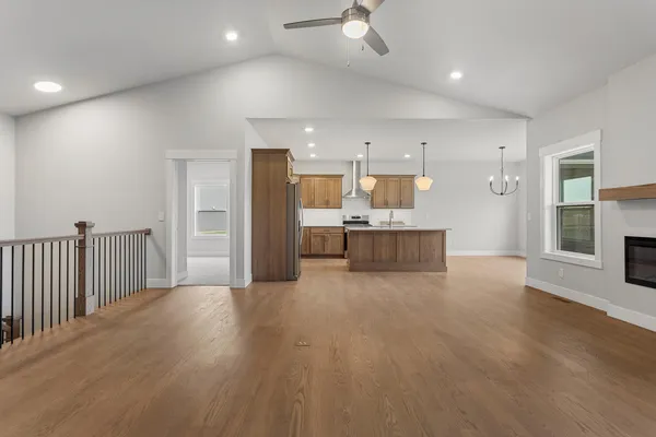 a view of a kitchen with a sink and a stove top oven