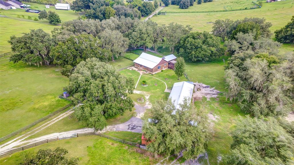 4292 Southwest 73rd Trail Bushnell, FL 33513 - Photo 63 of 85 a view of a lake with a yard