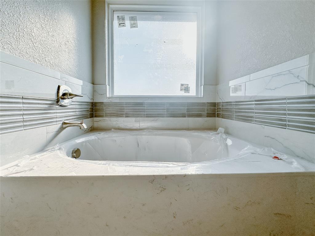 1341 Promised Land Road Hewitt, TX 76643 - Photo 18 of 34 a close view of sink and tap