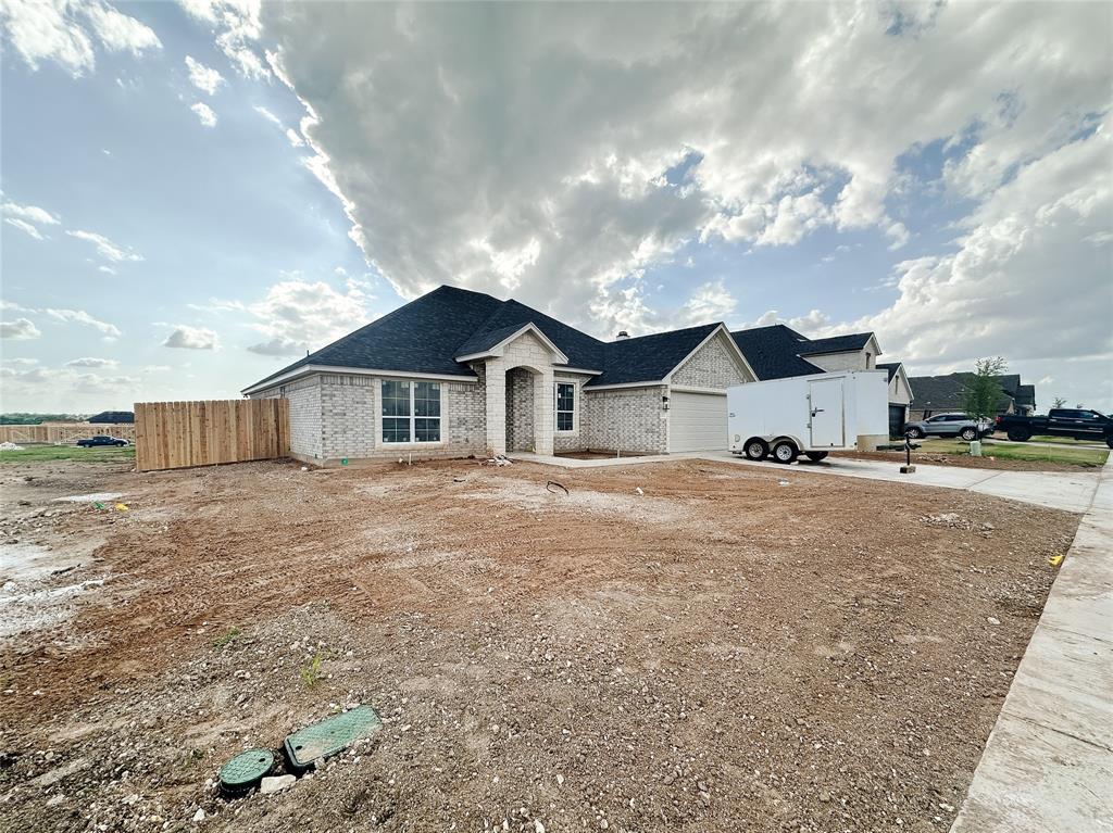 1341 Promised Land Road Hewitt, TX 76643 - Photo 2 of 34 a view of a house with a yard