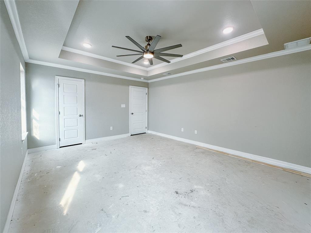 1341 Promised Land Road Hewitt, TX 76643 - Photo 27 of 34 an empty room with windows and fan