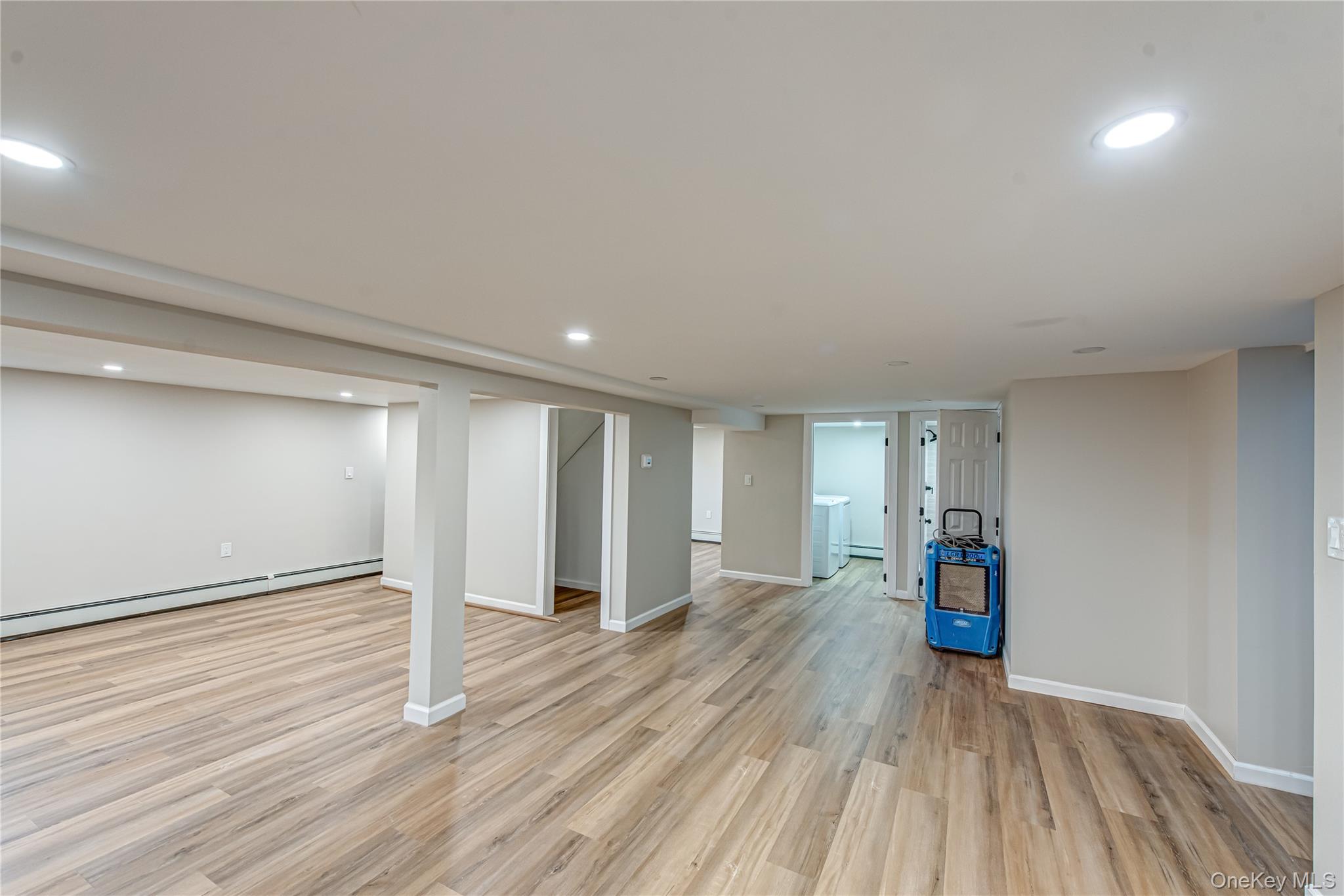 31 Terrell Street Patchogue, NY 11772 - Photo 15 of 21 a view of empty room with wooden floor