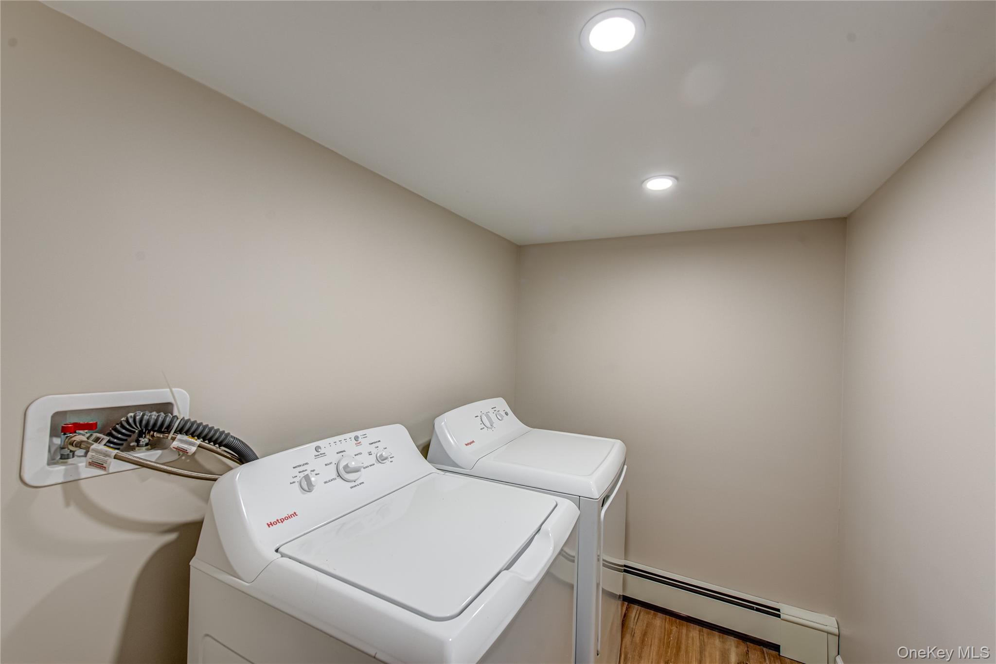 31 Terrell Street Patchogue, NY 11772 - Photo 17 of 21 a utility room with dryer and washer