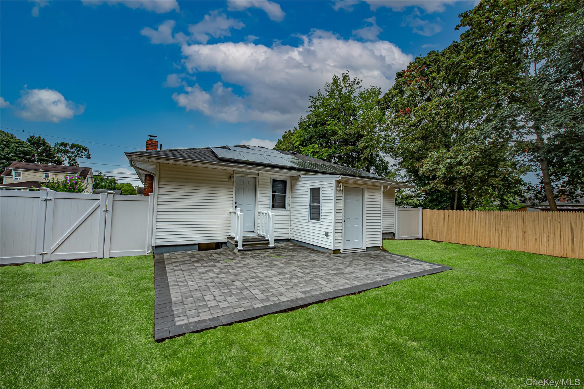 31 Terrell Street Patchogue, NY 11772 - Photo 21 of 21 a view of a house with a yard