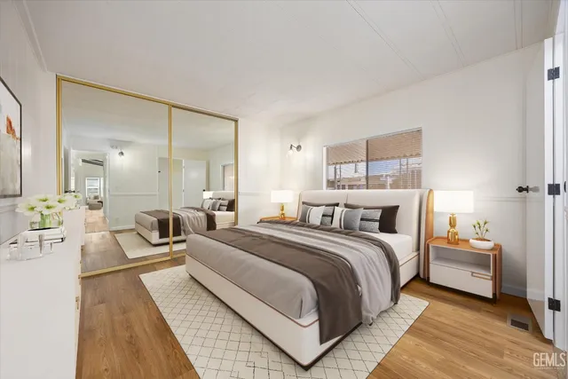 a bedroom with a bed and a couch