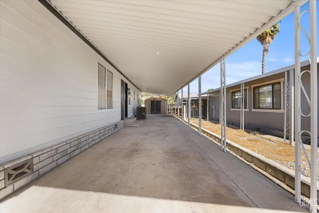 a view of a house with a large window