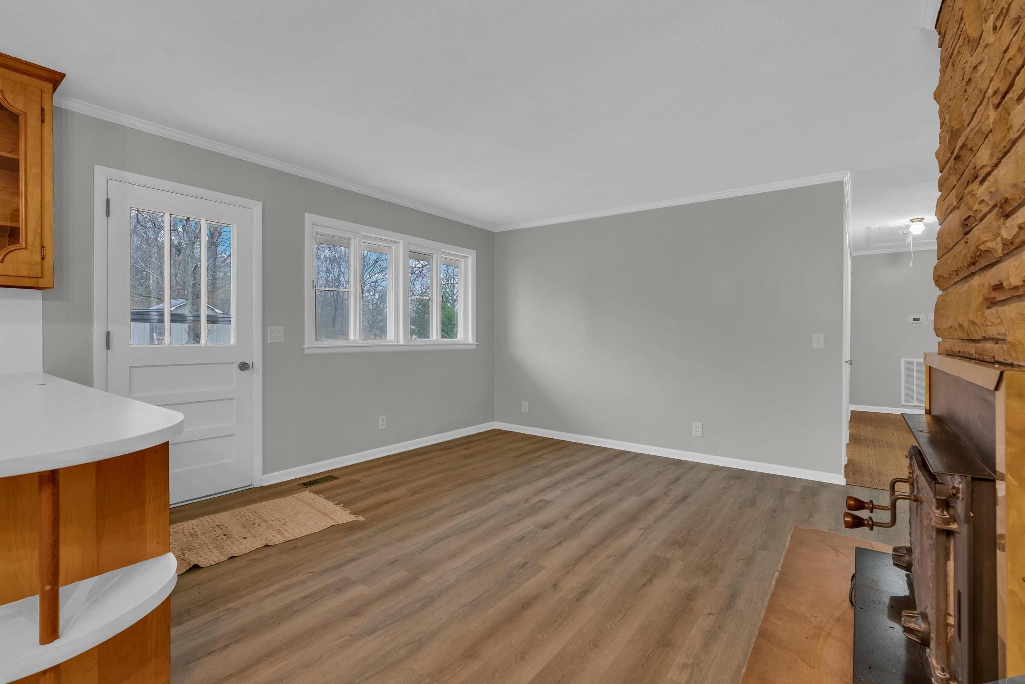 540 4th Avenue South Baxter, TN 38544 - Photo 11 of 26 a view of empty room with wooden floor and fan