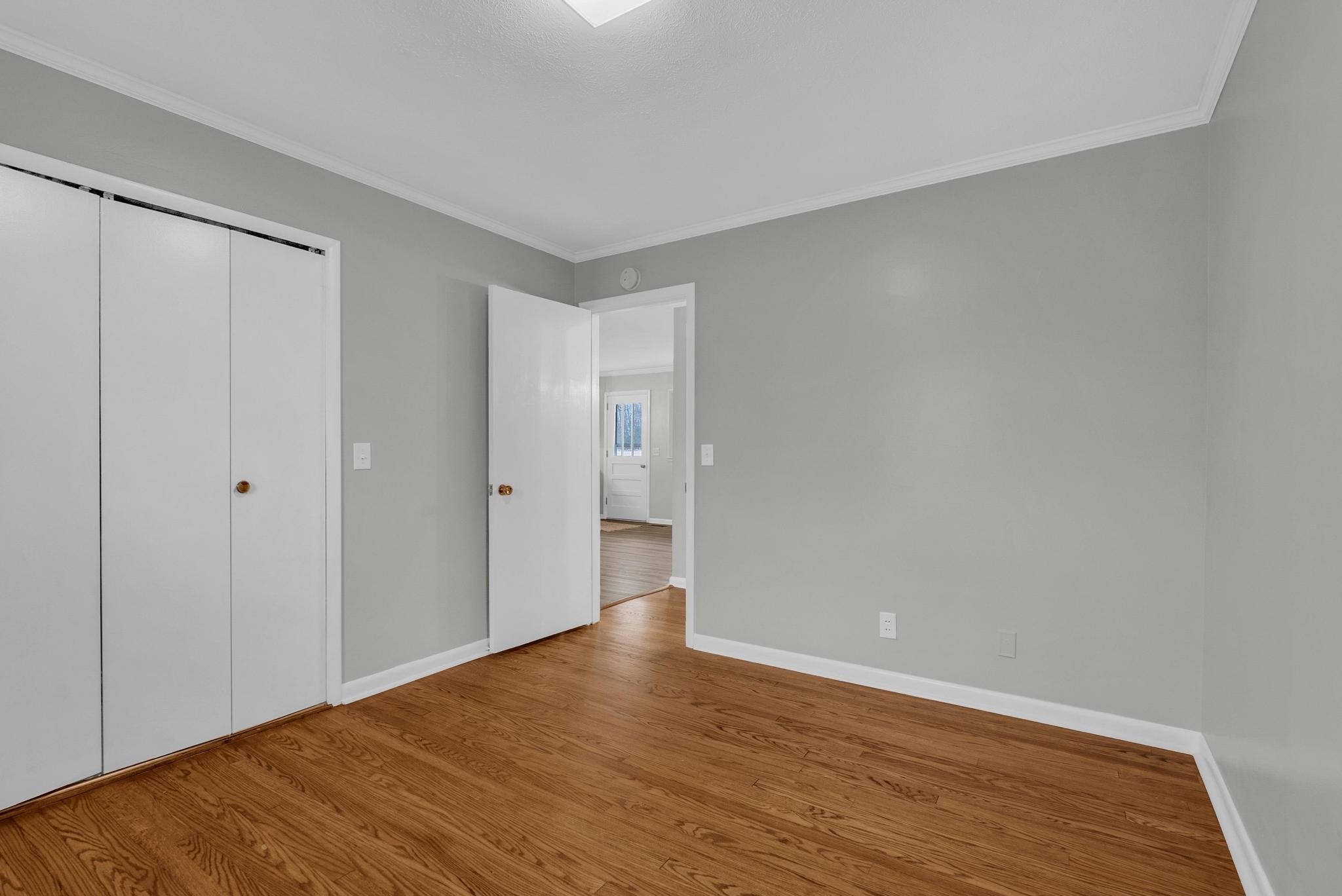 540 4th Avenue South Baxter, TN 38544 - Photo 14 of 26 a view of an empty room with wooden floor