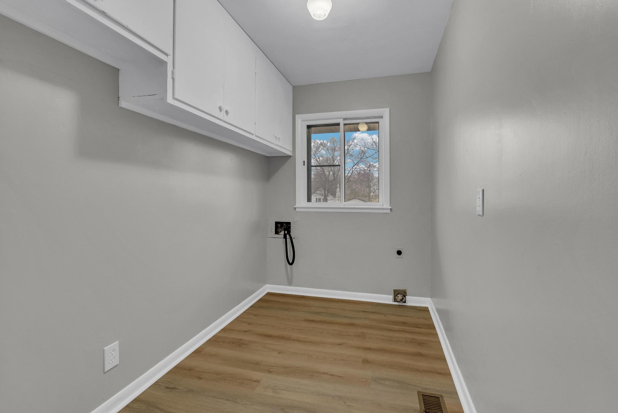 540 4th Avenue South Baxter, TN 38544 - Photo 19 of 26 a view of a room with wooden floor and cabinets