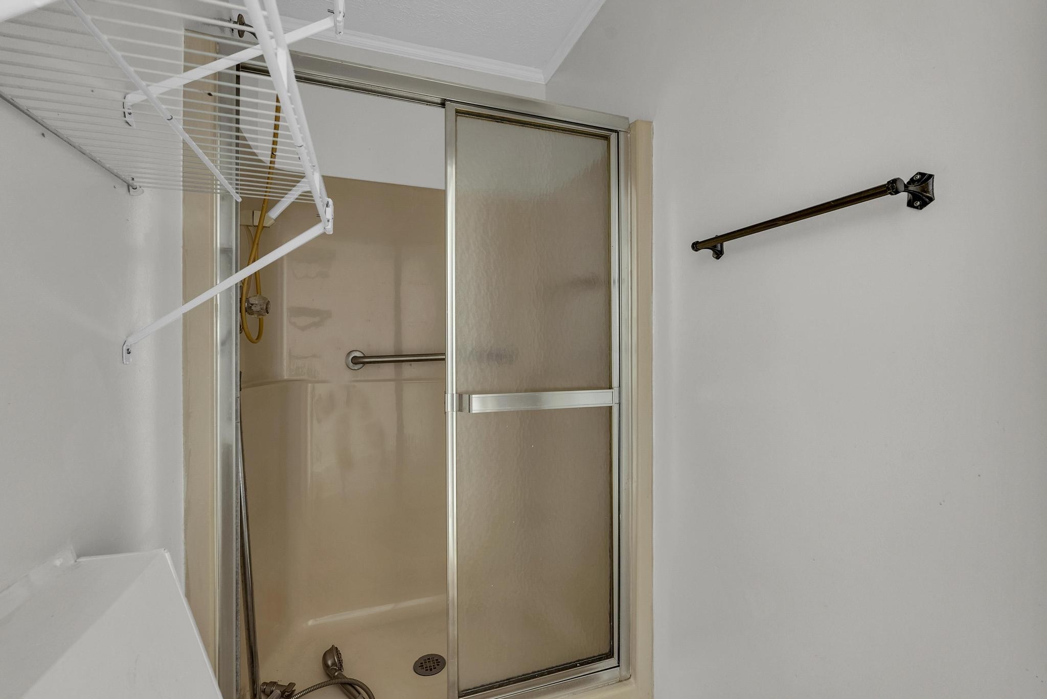 540 4th Avenue South Baxter, TN 38544 - Photo 24 of 26 a bathroom with a glass shower door