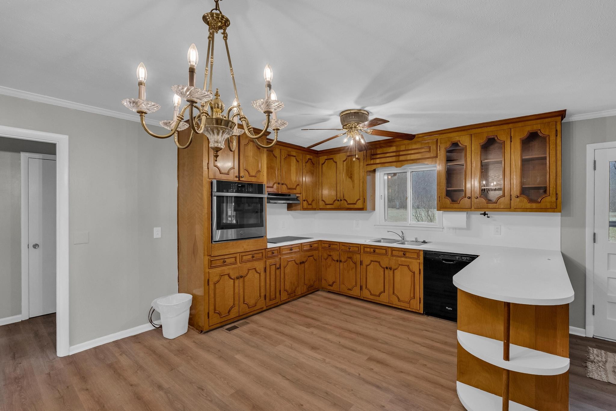 540 4th Avenue South Baxter, TN 38544 - Photo 9 of 26 a kitchen with stainless steel appliances granite countertop a sink and wooden floor