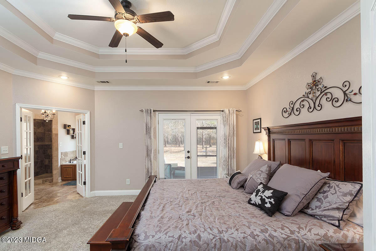170 Terrell Road Elko, GA 31025 - Photo 12 of 35 a bedroom with a bed and a mirror