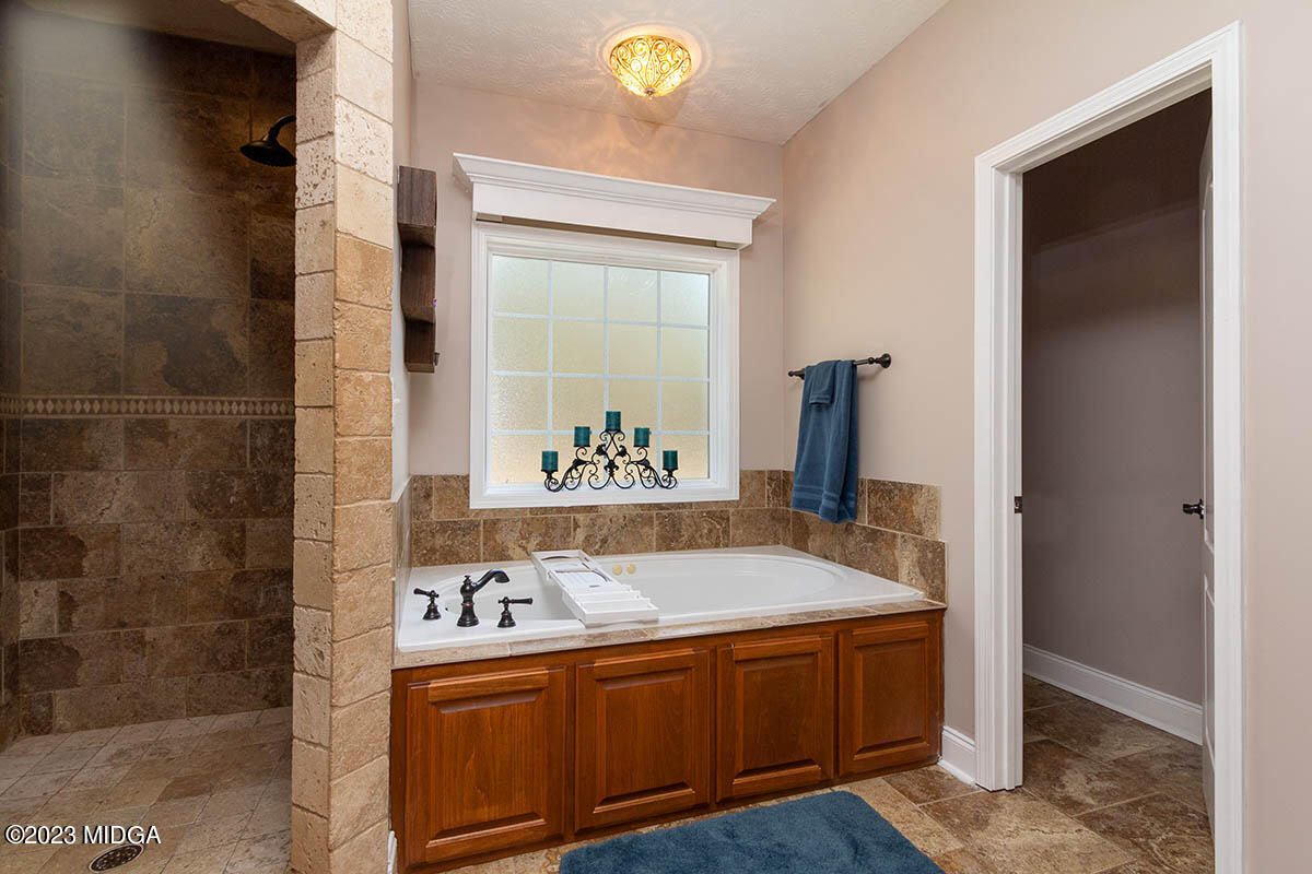 170 Terrell Road Elko, GA 31025 - Photo 15 of 35 a bathroom with a tub and a view of bathroom