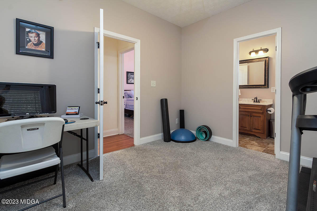 170 Terrell Road Elko, GA 31025 - Photo 19 of 35 a view of living room filled with furniture and a flat screen tv