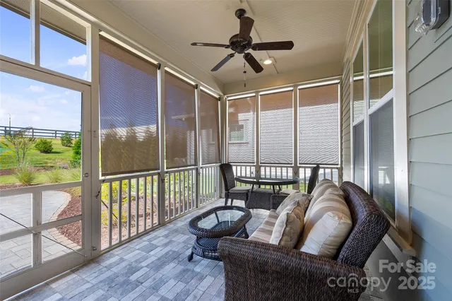 a view of a swimming pool with a yard