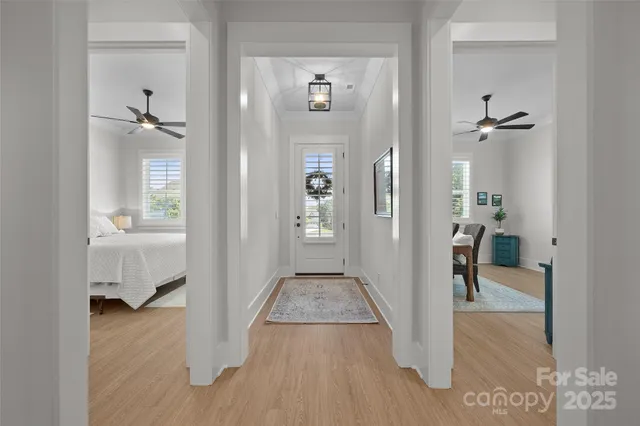 a view of entryway with wooden floor