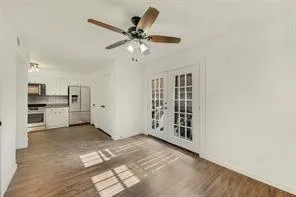a view of a kitchen with a sink and cabinet area