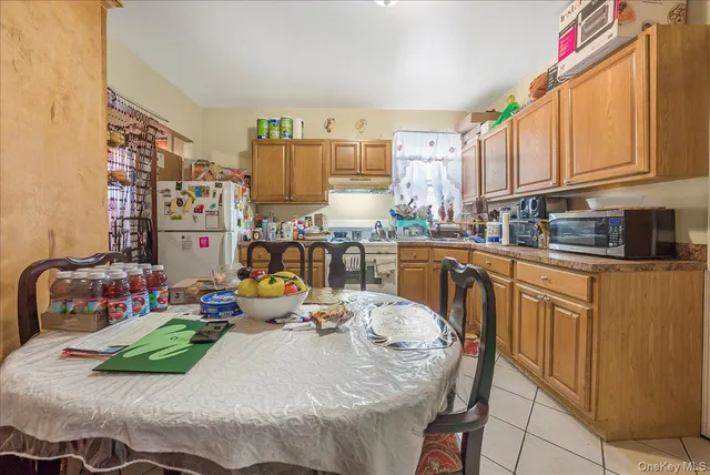 a bed room with furniture and a large window