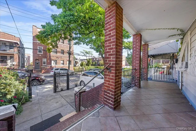 a view of a chairs and table in the patio