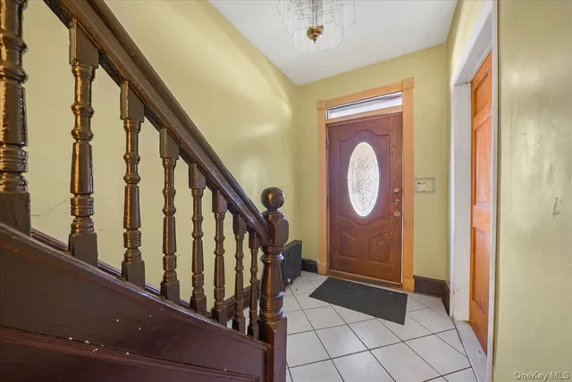 a view of an entryway with a door