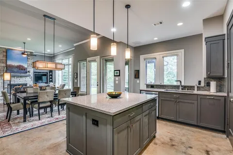 a bed room with a bed and a chandelier