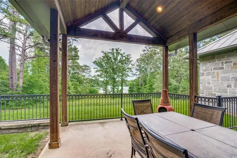 a view of a backyard with a garden and plants