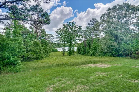 a view of a lake with a city