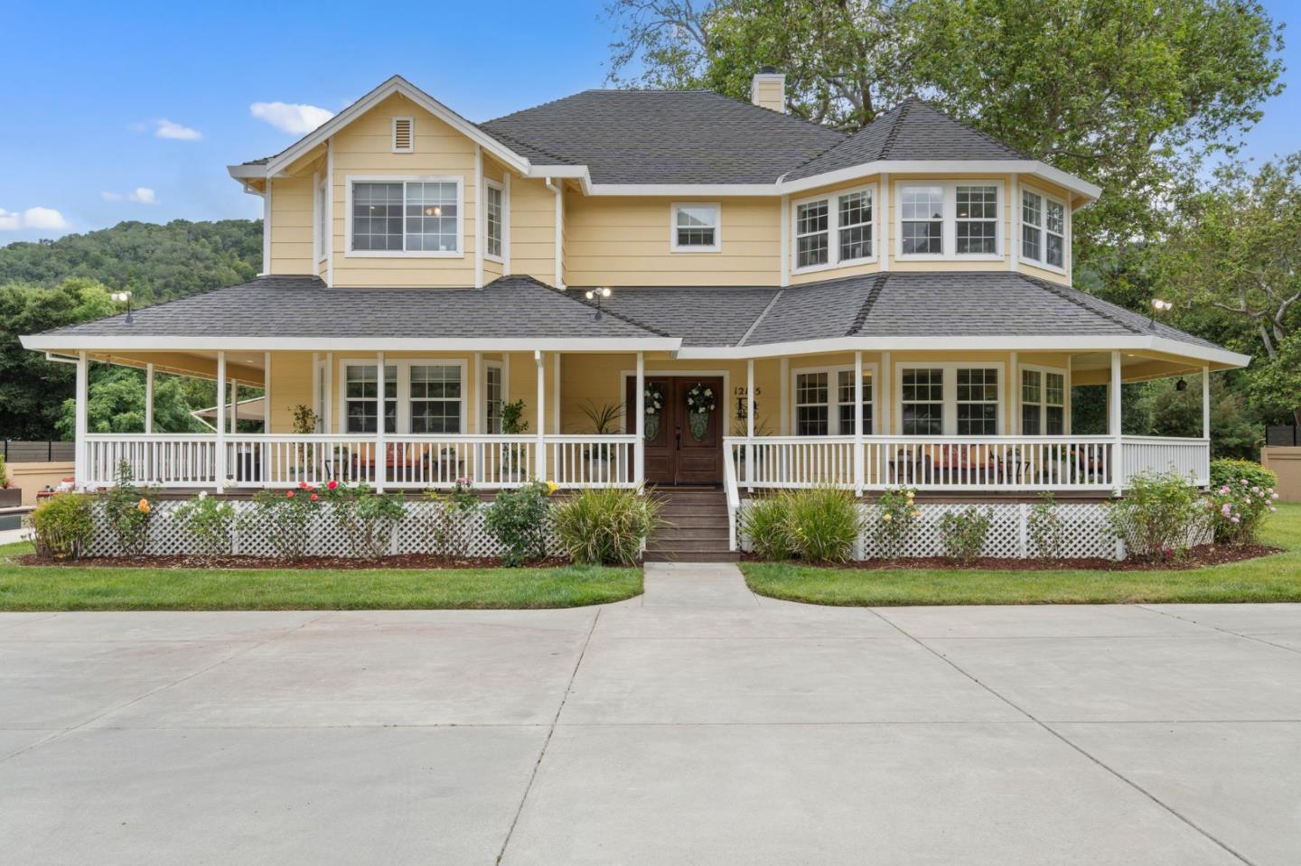 12135 Watsonville Road Gilroy, CA 95020 - Photo 2 of 83 a front view of a house with a yard