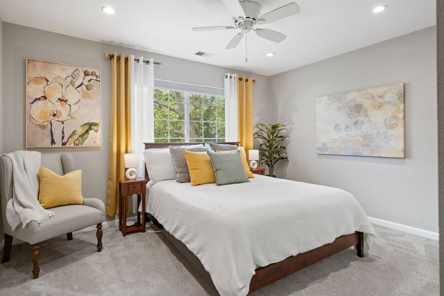 12135 Watsonville Road Gilroy, CA 95020 - Photo 29 of 83 a bedroom with a bed and a painting on the wall