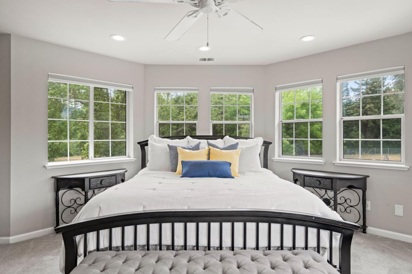 12135 Watsonville Road Gilroy, CA 95020 - Photo 31 of 83 a bedroom with a bed a large window and potted plant on the dresser