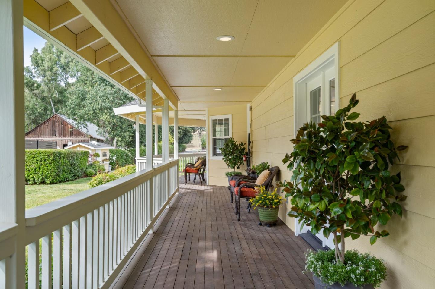 12135 Watsonville Road Gilroy, CA 95020 - Photo 52 of 83 a view of a porch with wooden floor