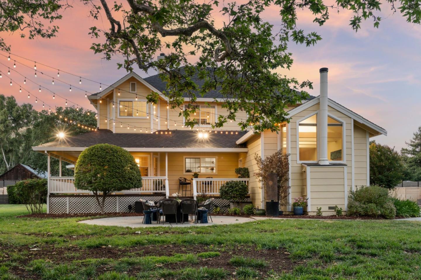 12135 Watsonville Road Gilroy, CA 95020 - Photo 74 of 83 a front view of a house with a yard and garage
